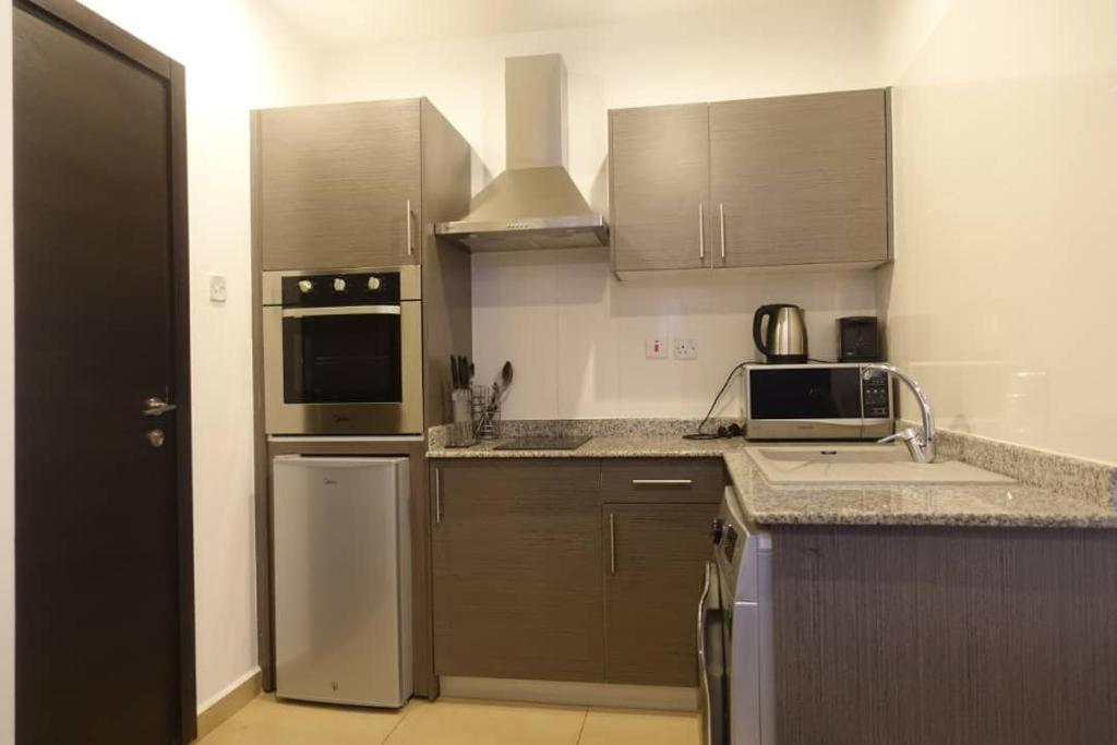 The Gallery Luxury Suites Cpg East Legon Eksteriør billede